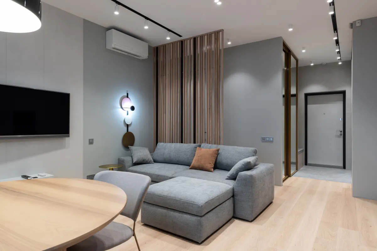 Reverse-cycle air conditioner in a Victorian living room, installed under the Victorian Energy Upgrades program