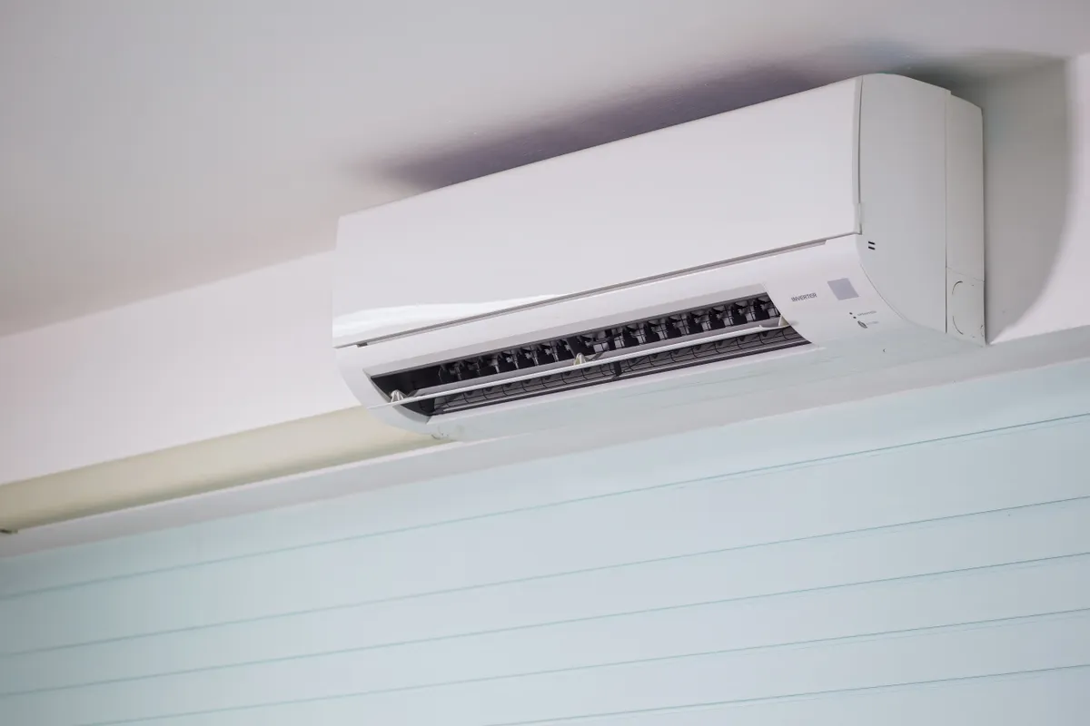Wall-mounted split system air conditioner indoor unit in a home